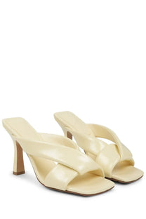 Bottega Veneta women’s Sandalo Riva beige cream-colored patent leather mules with sleek minimalist design and block heel