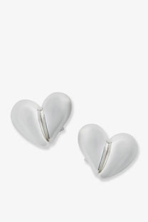 Bottega Veneta women’s silver heart-shaped clip earrings with a smooth glossy finish and subtle metallic lines