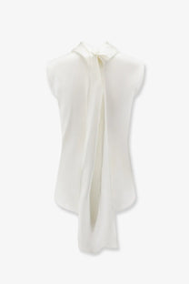 A white off-white silk blouse with a high collar and flowing front tie by Bottega Veneta women’s stretch satin top