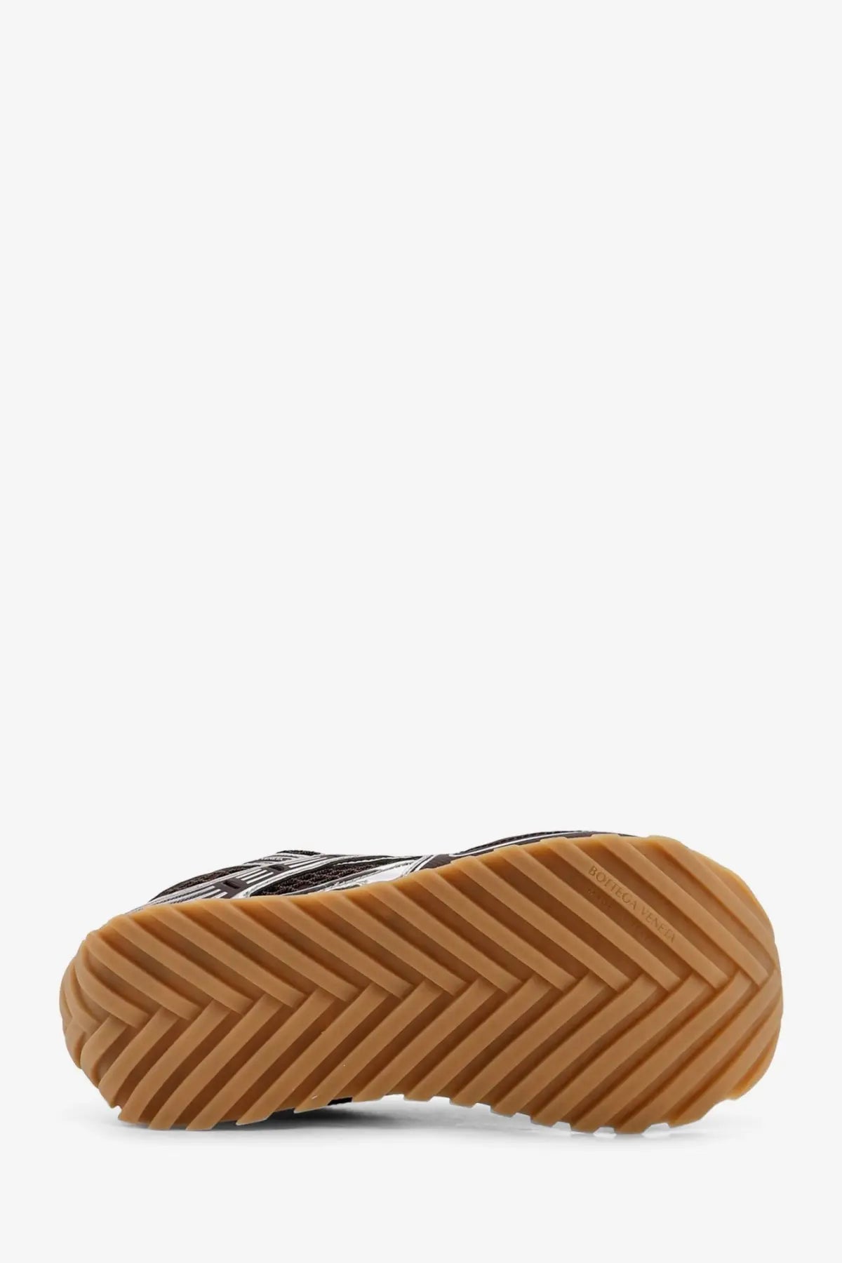 Tan rubber sole with herringbone tread pattern on bottega veneta women’s brown technical fabric low top orbit sneakers