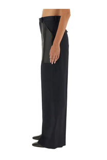 Bottega Veneta women’s blue wool and cotton pants with sleek black wide-leg design and contrasting leather panels