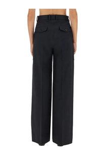 Black wide-leg wool and cotton trousers with structured waistband and flap pockets from bottega veneta