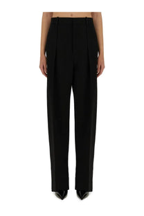 Bottega Veneta women’s black wool pants with high-waisted tailored straight-leg cut and pleated front