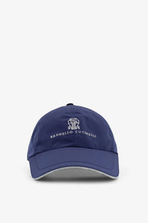 Navy blue Brunello Cucinelli men’s baseball hat with white embroidered logo and brand name on the front