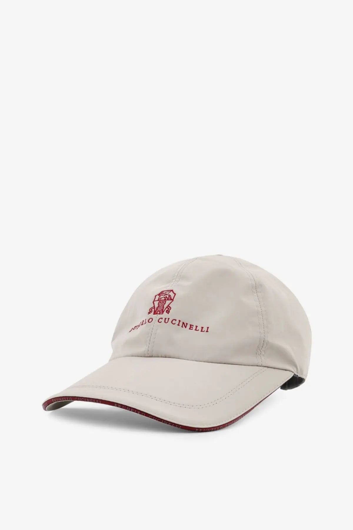 Beige brunello cucinelli men’s baseball hat with red embroidered logo and brand name in cotton material