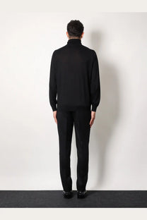 Brunello Cucinelli men’s black cashmere and silk turtleneck sweater with smooth fitted silhouette and ribbed cuffs