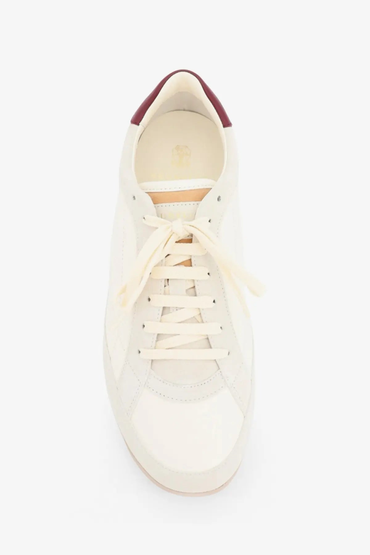 Brunello Cucinelli men’s white leather sneaker with burgundy heel tab and cream laces front view