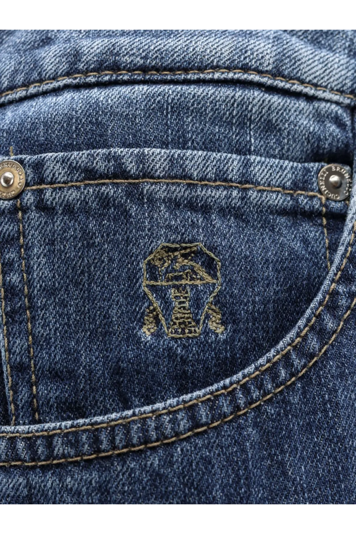 Blue denim cotton jeans pocket with gold-threaded brunello cucinelli logo and silver button fastenings back side view