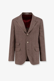 A tailored brown textured wool blazer with burgundy satin lining and notched lapels in Brunello Cucinelli beige linen style