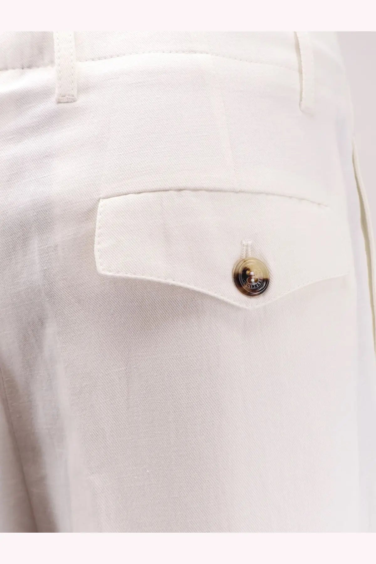 White linen and cotton trousers featuring a gold-tone button engraved with brunello cucinelli brand name