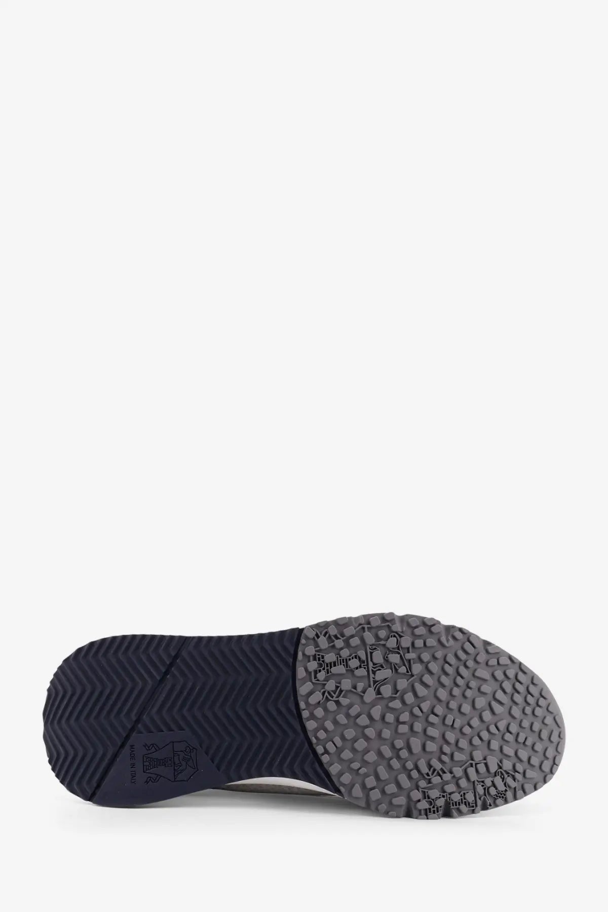 The shoe sole of brunello cucinelli men’s low top cotton knit and leather sneakers features navy rubber with grey heel tread