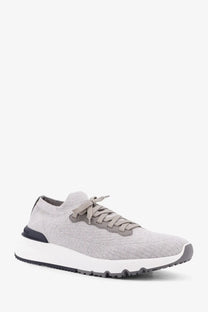 Brunello Cucinelli men’s low top cotton knit and leather sneaker in gray with white midsole and black heel accents back view
