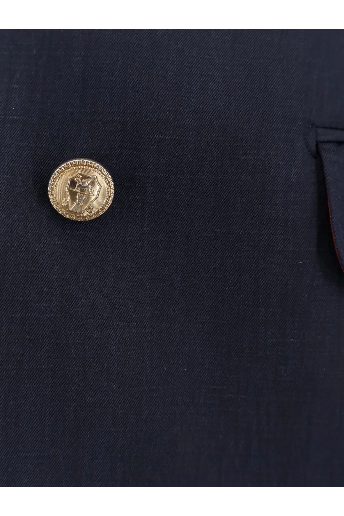Gold-toned circular button with embossed design and beaded edge on brunello cucinelli men’s blue silk and linen blazer