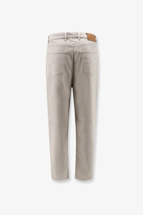 Back side of brunello cucinelli men’s stretch canvas beige trousers with classic pocket and brown leather patch
