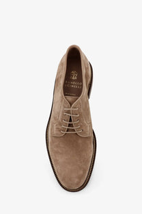 Brunello Cucinelli men’s tan suede derby shoe with matching laces and dark brown leather sole