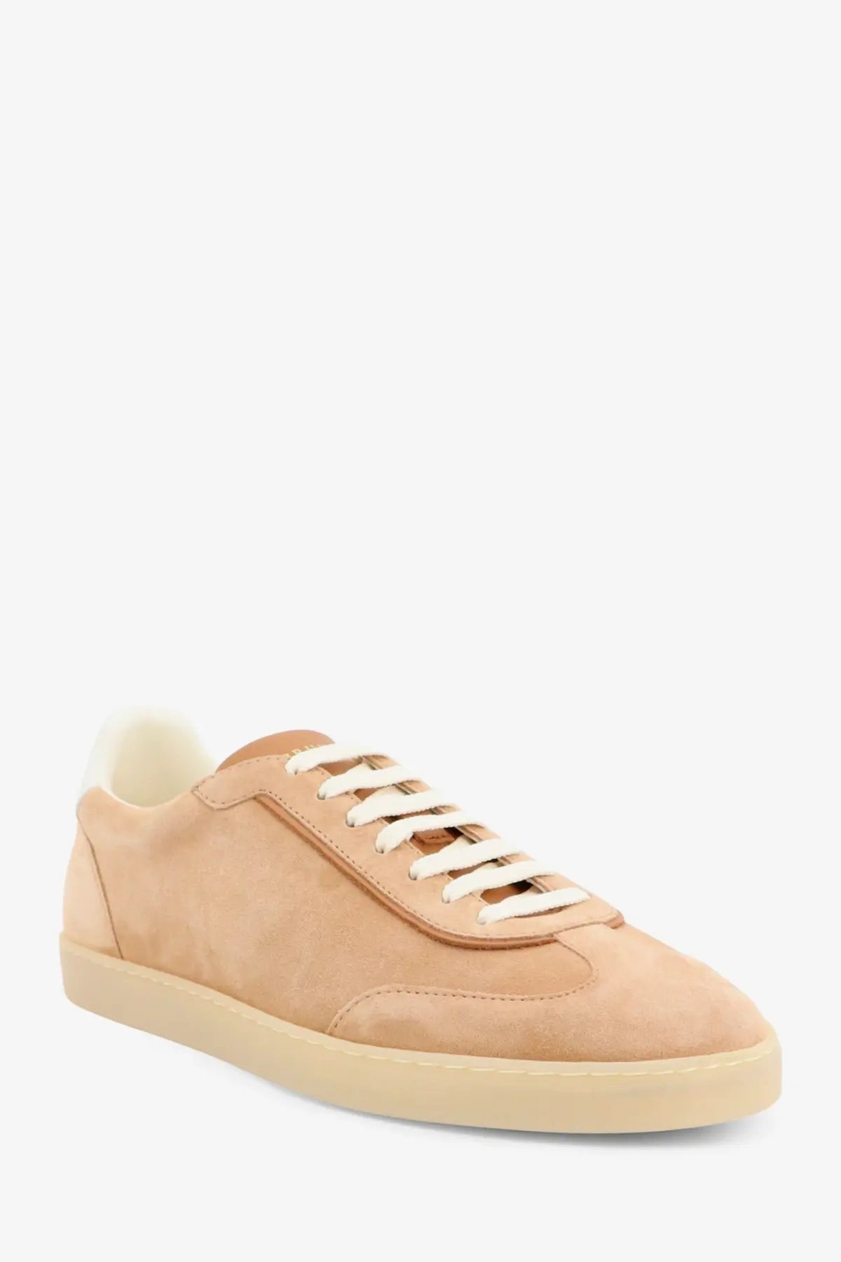 Brunello Cucinelli men’s tan suede low-top sneaker with white laces and matching rubber sole in beige