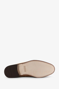 Tan leather brunello cucinelli men’s dress shoe with dark brown rubber sole and stitched lining from antelope collection