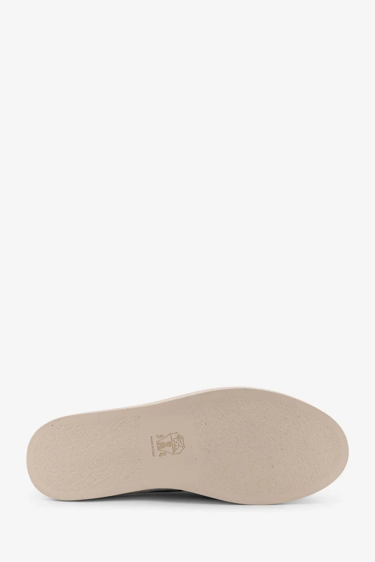 Beige rubber sole with subtle texture and embossed logo near the heel of brunello cucinelli men’s black suede loafers back view