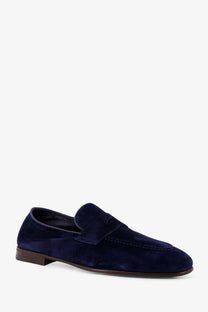 Navy blue suede Brunello Cucinelli men’s loafer with classic moccasin design and brown leather sole