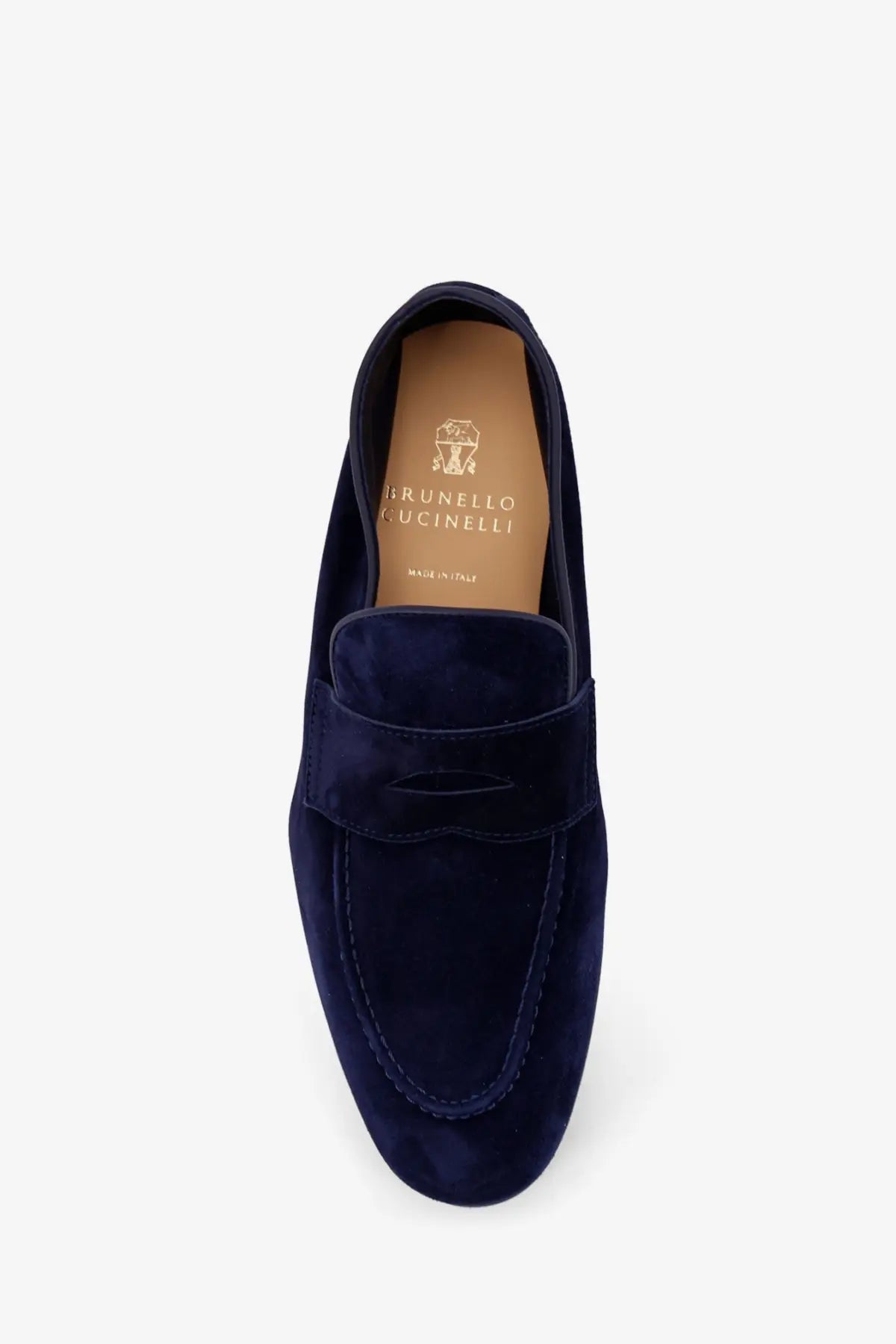 Navy blue suede loafer with classic moccasin design and brunello cucinelli label on the insole