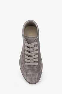 Brunello Cucinelli men’s grey suede sneakers with matching laces and minimalist design