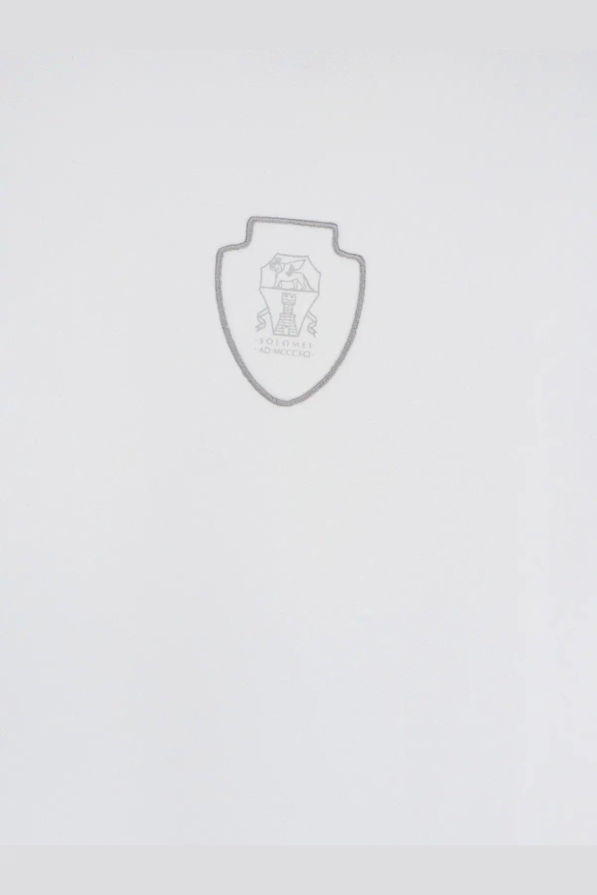 Gray shield-shaped emblem with detailed crest and text on white brunello cucinelli men’s technical fabric polo shirt