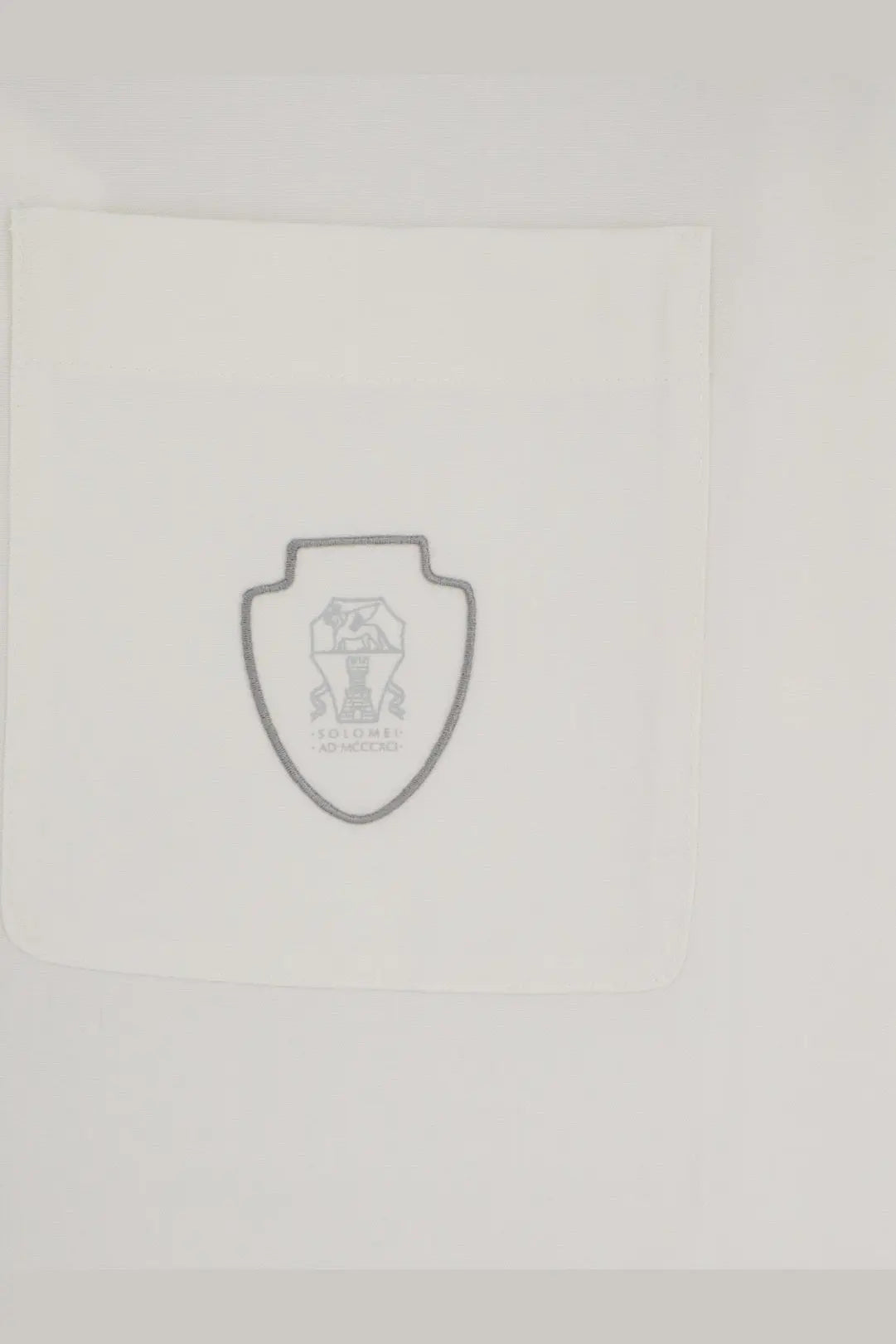 Brunello cucinelli men’s white virgin wool polo shirt with a white paper napkin featuring a gray shield logo