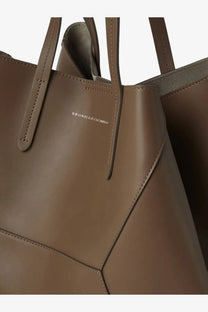 Brunello Cucinelli women’s green taupe leather tote bag with clean stitching and minimalist hammered leather design