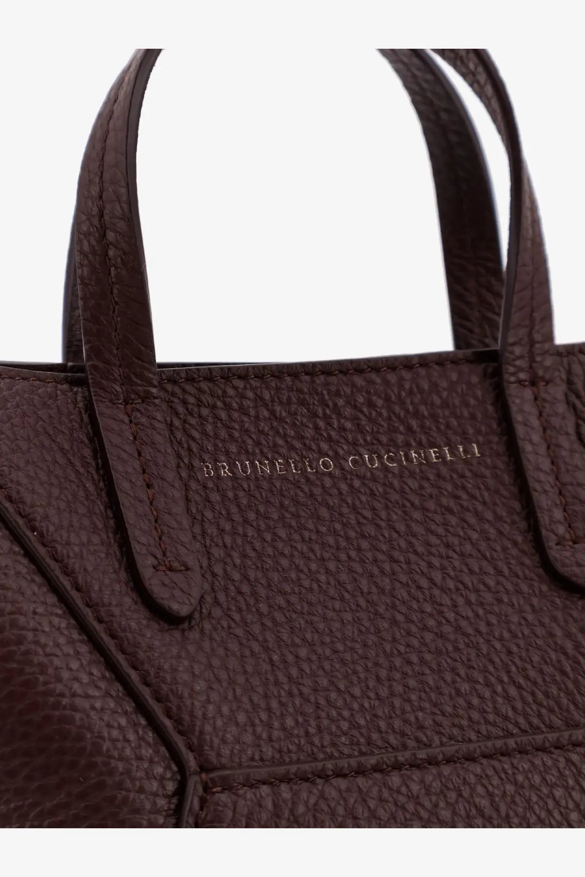 Brunello Cucinelli women’s red leather crossbody bag featuring a rich brown textured tote with embossed brand name