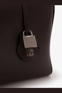 Brunello Cucinelli women’s black leather crossbody bag with silver traveller padlock and brand crest detailing