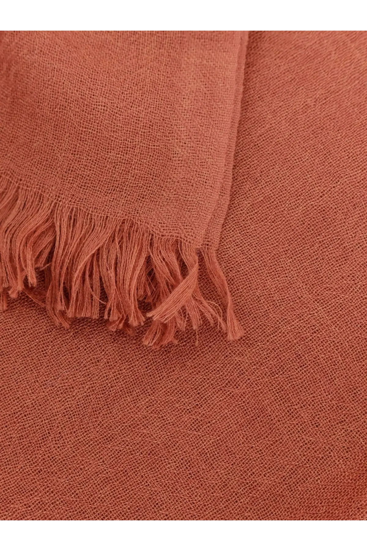 Brunello Cucinelli women’s cashmere and silk scarf in soft terracotta with textured weave and natural frayed edges