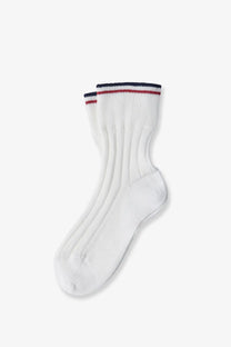 Brunello Cucinelli women’s white cotton ankle sock with ribbed texture and navy red striped cuff