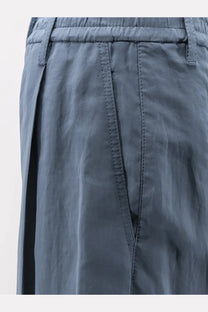 Brunello Cucinelli women’s cotton trousers in dark gray with relaxed fit pleats and subtle stitching details