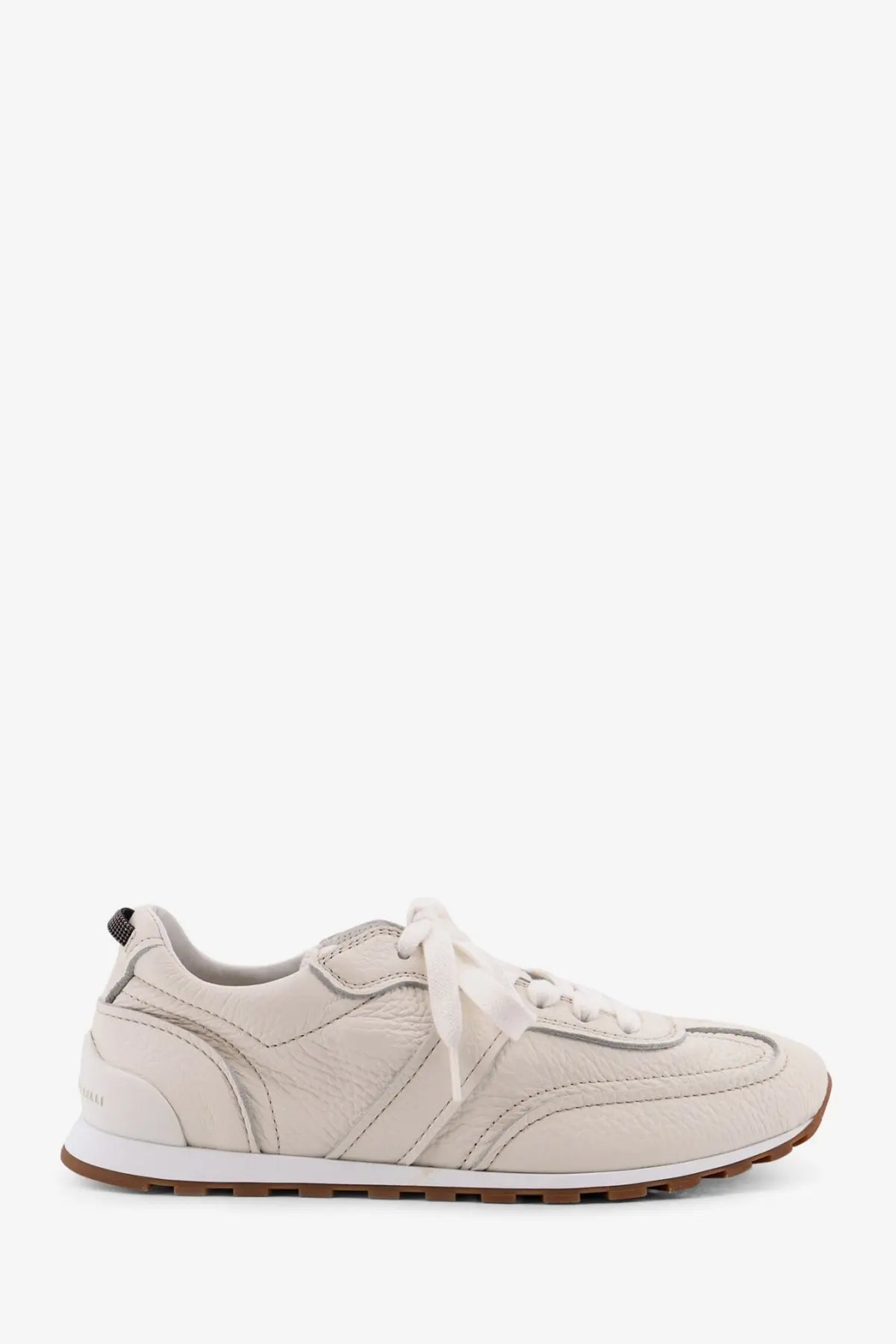 Brunello Cucinelli women’s leather sneakers in cream with white laces and brown rubber sole