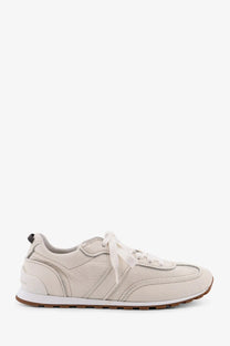 Brunello Cucinelli women’s leather sneakers in cream with white laces and brown rubber sole