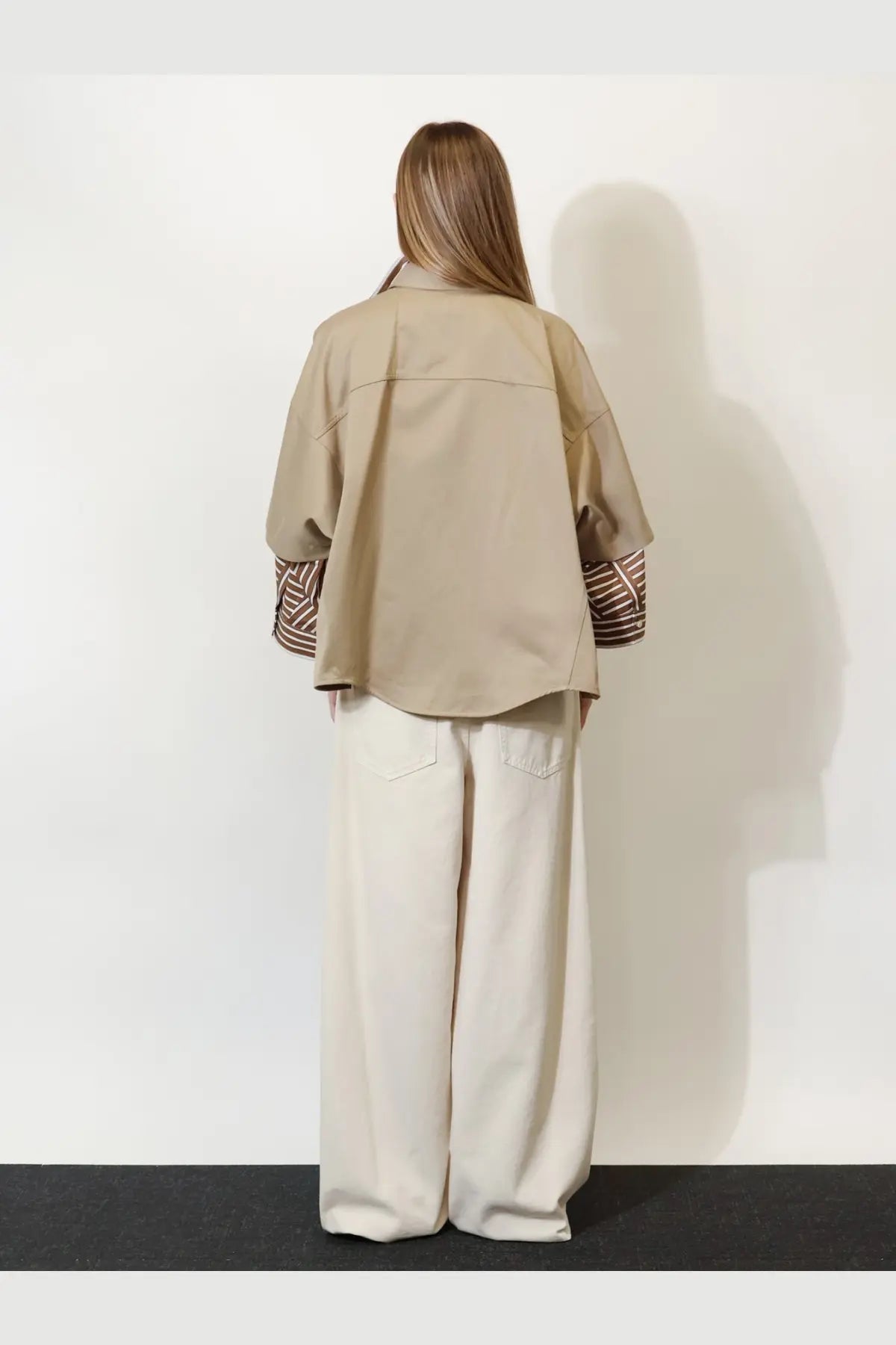 Brunello Cucinelli women’s beige oversized shirt made of linen and cotton blend with striped cuffs