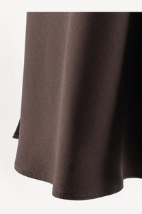 Brunello Cucinelli women’s flowing dark brown satin long skirt with smooth texture and neatly stitched hem