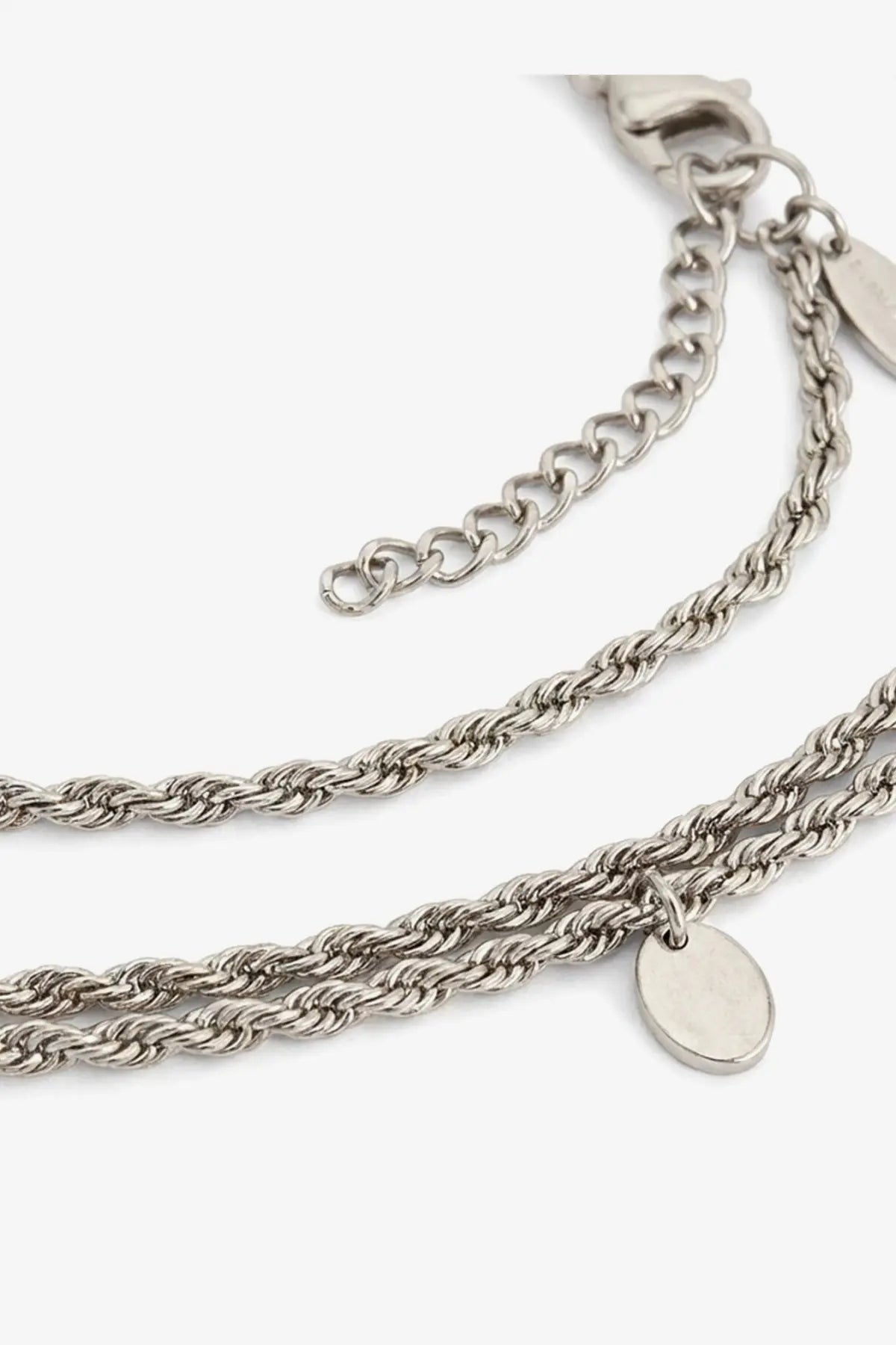 Brunello cucinelli women’s silver necklace featuring a silver rope chain with a small oval pendant
