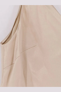 Beige Brunello Cucinelli women’s sleeveless stretch silk top with smooth textured fabric and clean shoulder seam stitching