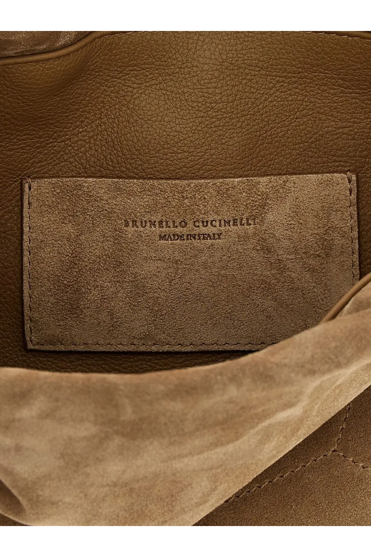 Brunello Cucinelli women’s beige suede shoulder bag with tan suede interior lining and matching branded label