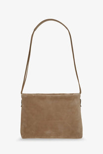Brunello Cucinelli women’s beige tan suede shoulder bag with minimalist design and slender strap