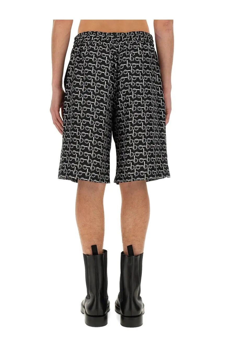 Burberry men’s black bermuda shorts with all over white horsebit print perfect for casual summer wear