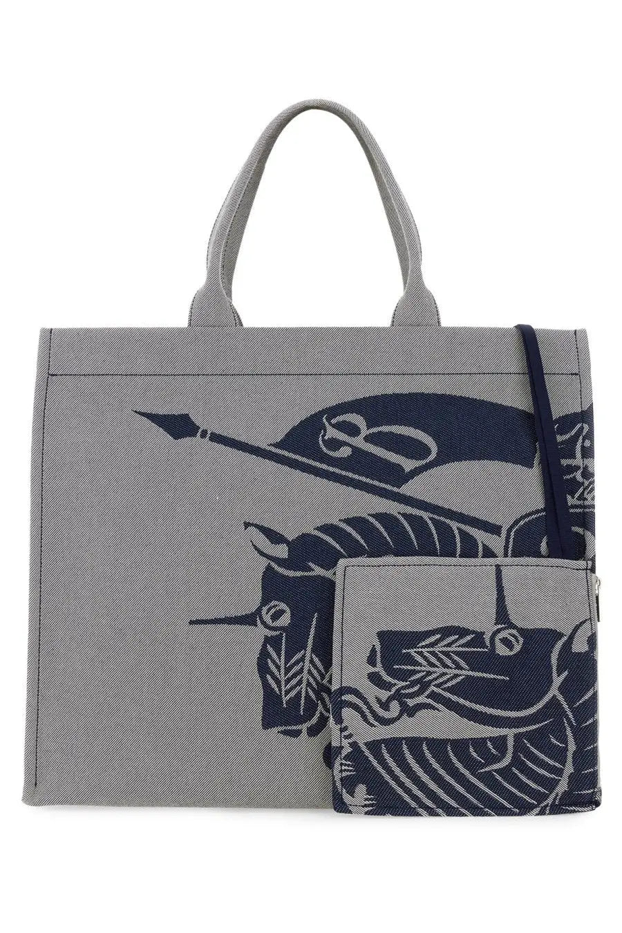 Burberry men’s grey canvas tote bag with bold navy blue graphic of stylized mythical creatures and flags