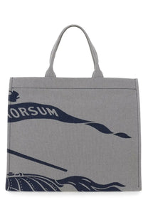 Burberry men’s gray canvas tote bag with navy blue orsum banner and stylized wave graphic print