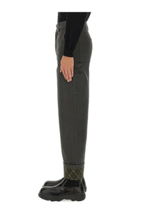 Burberry men’s carpenter pants grey with dark gray fabric and subtle plaid lining at rolled cuffs