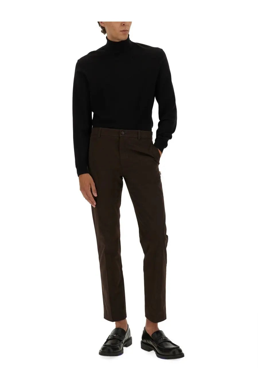 Black turtleneck sweater with long sleeves and ribbed collar paired with burberry men’s brown cotton chino pants