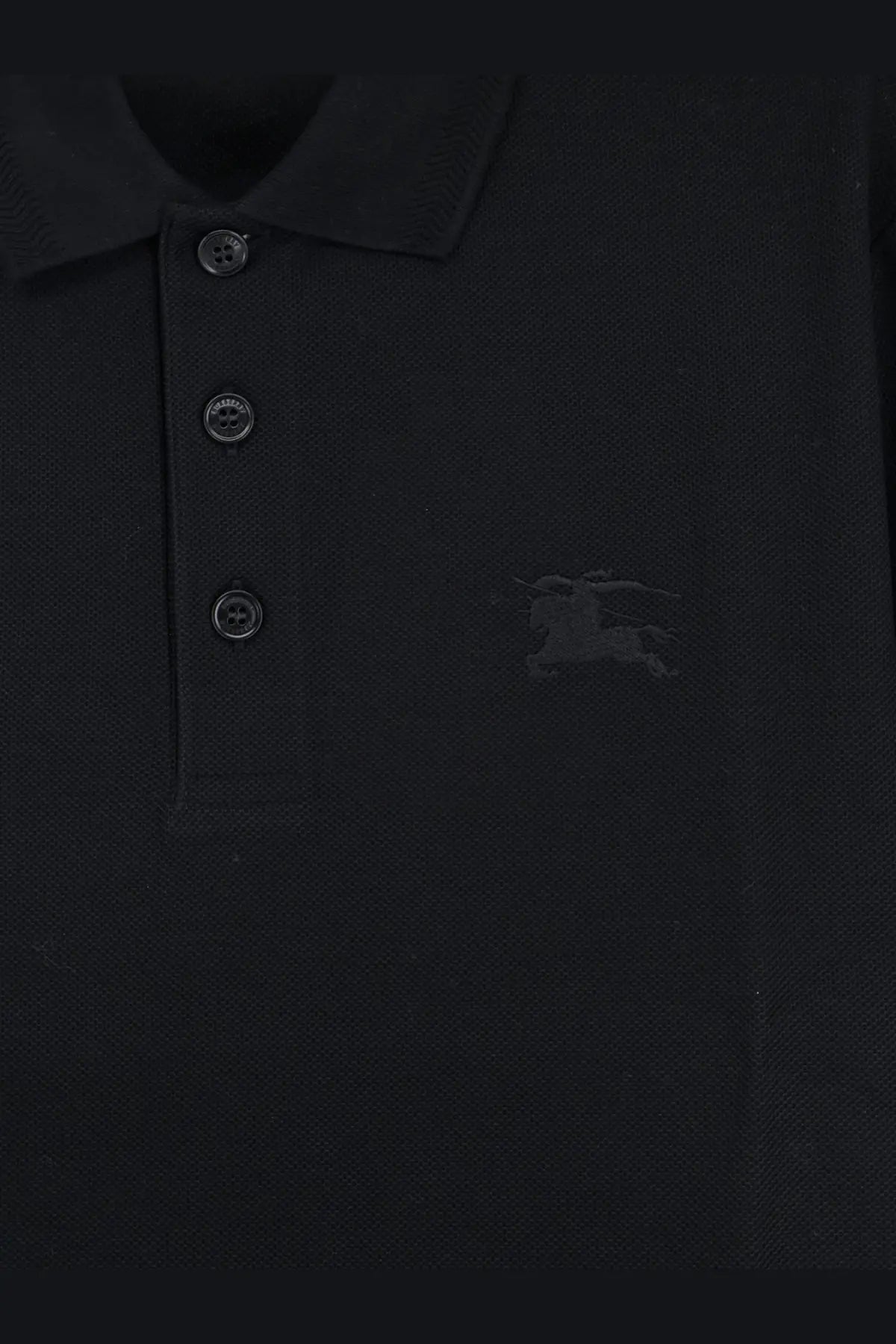 Burberry men’s black cotton polo shirt with subtle embroidered logo and matching black buttons on the chest