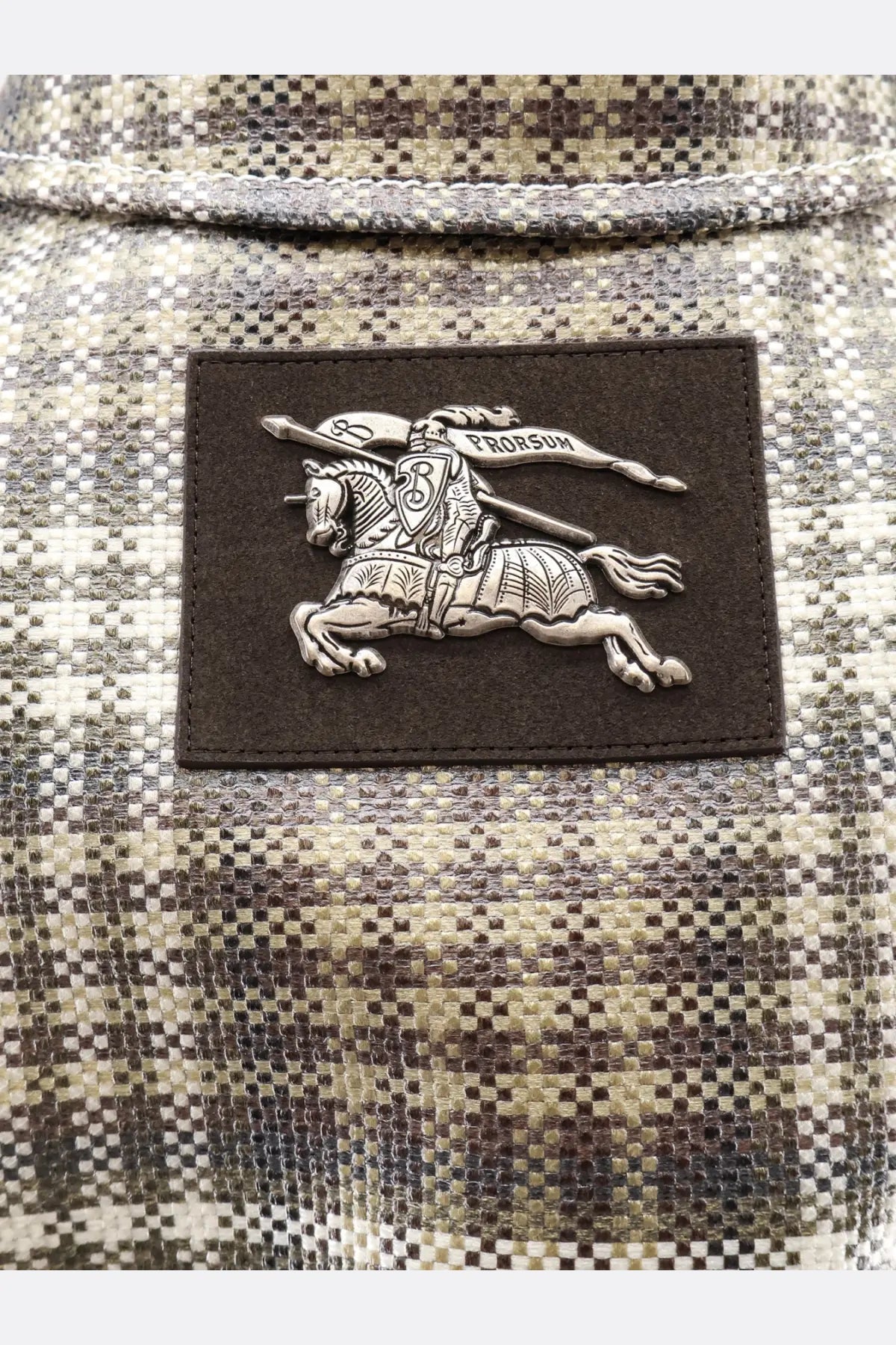 Silver embroidered knight patch on dark brown leather backing on burberry mens foxfield madras trench white plaid fabric