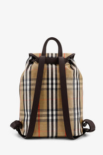 Beige and black plaid coated canvas Burberry men’s Highlands backpack with brown leather straps and top handle