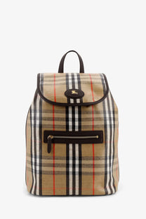 Burberry men’s Highlands coated canvas backpack in beige black white and red plaid with brown leather trim and gold logo plaque